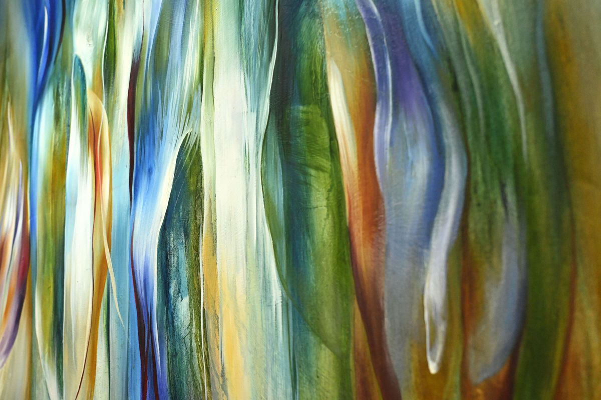 An abstract painting in vertical bands of blue, green and gold.